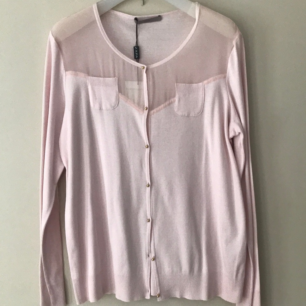 A luxury  designer tee with matching camisole.